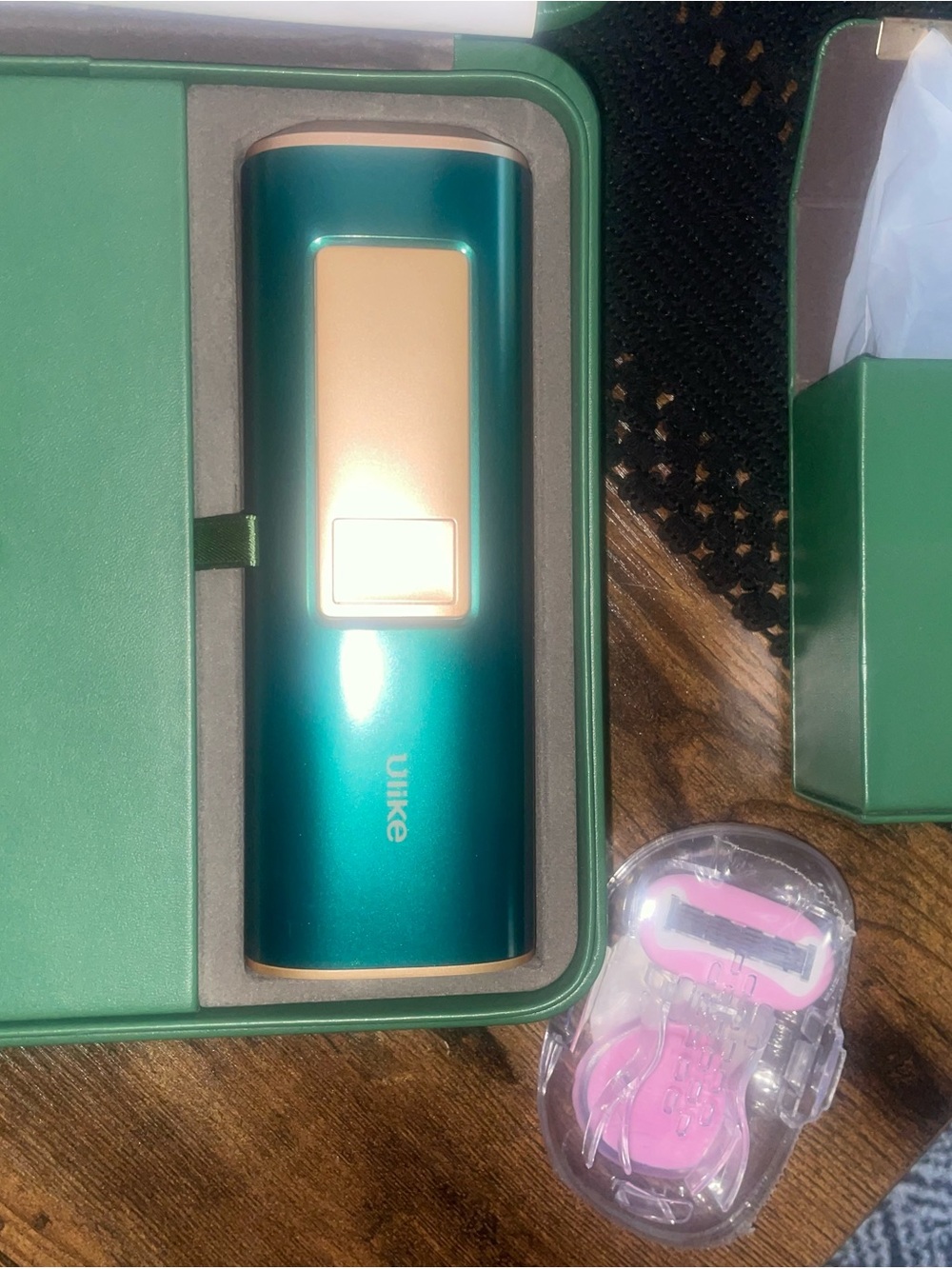 Ulike Teal & Rose Gold Handheld Device